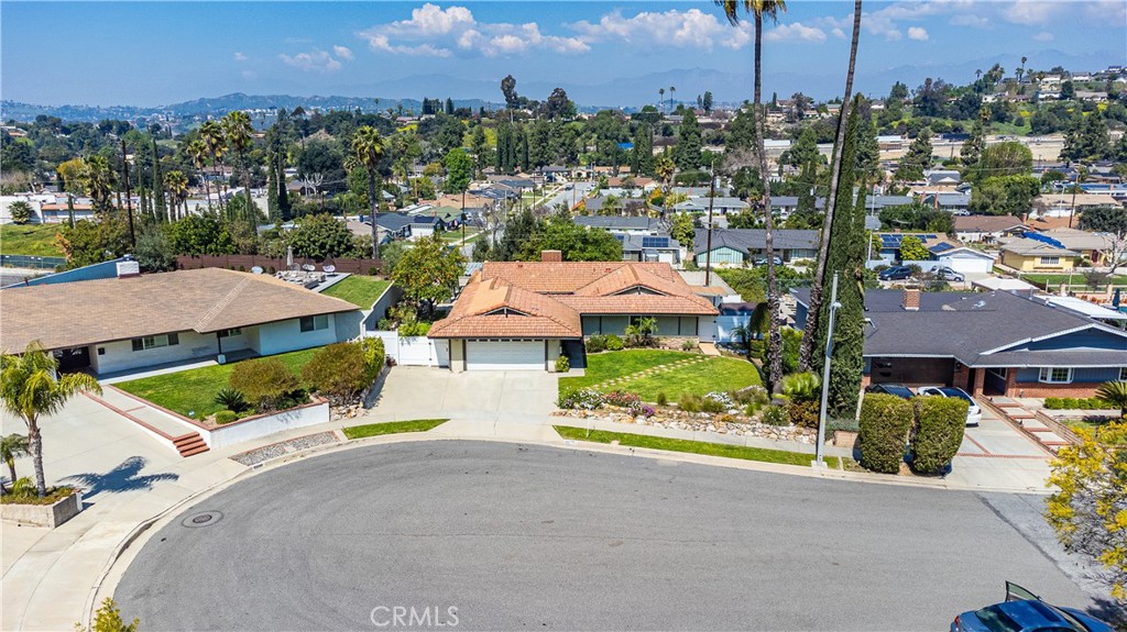 23711 Silver Spray Drive Diamond Bar, CA 91765 - Photo 11 of 49 an aerial view of a house with a garden and lake view