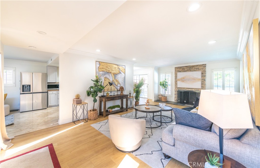 23711 Silver Spray Drive Diamond Bar, CA 91765 - Photo 13 of 49 a living room with furniture a large window and wooden floor