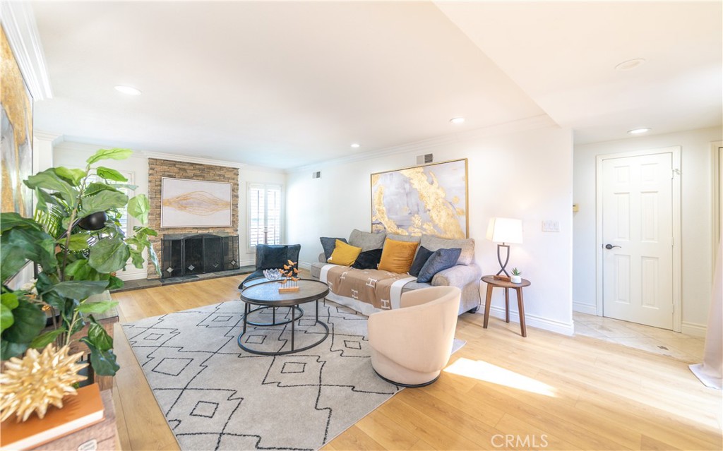 23711 Silver Spray Drive Diamond Bar, CA 91765 - Photo 15 of 49 a living room with patio furniture and a potted plant