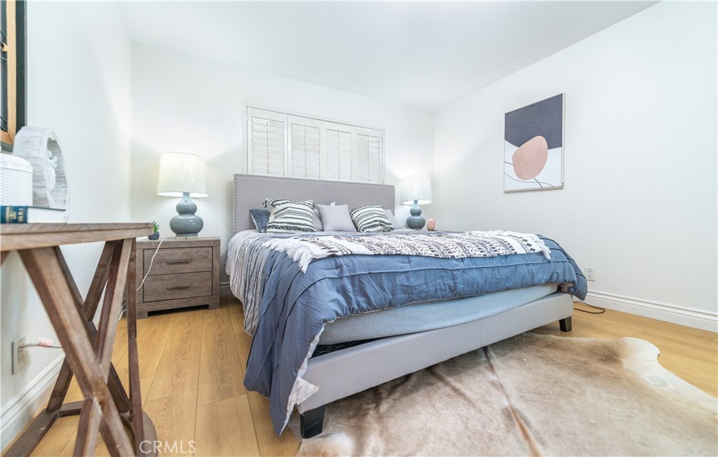 23711 Silver Spray Drive Diamond Bar, CA 91765 - Photo 25 of 49 a bedroom with a bed next to a white wall