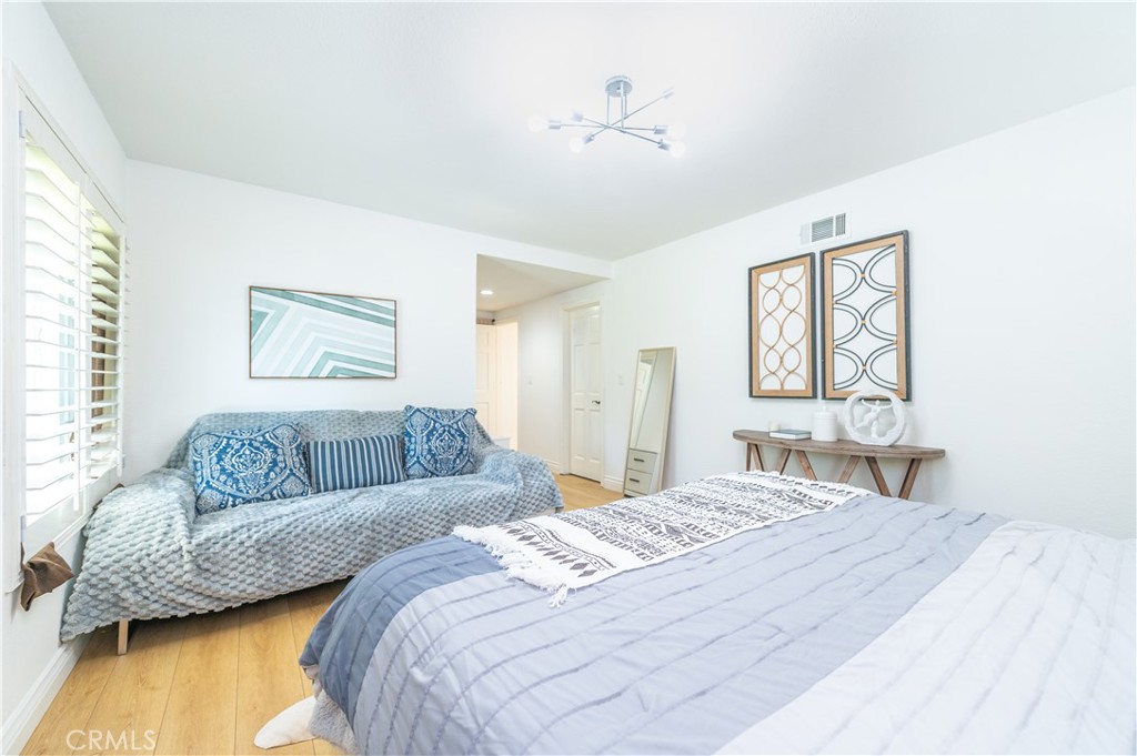 23711 Silver Spray Drive Diamond Bar, CA 91765 - Photo 27 of 49 a bedroom with a bed and a window