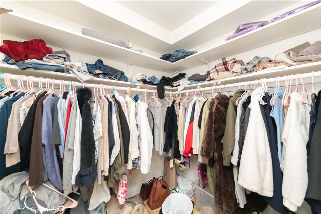 23711 Silver Spray Drive Diamond Bar, CA 91765 - Photo 30 of 49 a view of walk in closet with clothes and shoes