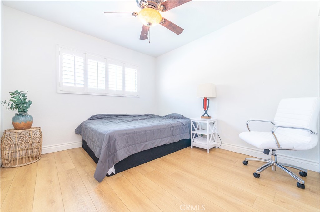 23711 Silver Spray Drive Diamond Bar, CA 91765 - Photo 34 of 49 a bedroom with a bed and a chandelier