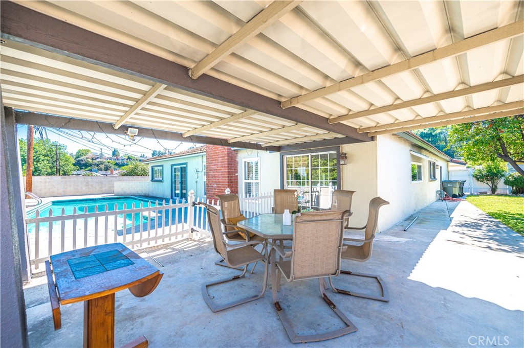 23711 Silver Spray Drive Diamond Bar, CA 91765 - Photo 38 of 49 a view of a patio with a table and chairs