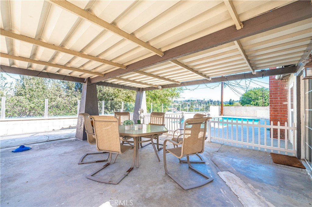 23711 Silver Spray Drive Diamond Bar, CA 91765 - Photo 39 of 49 a dining room with wooden floor and furniture