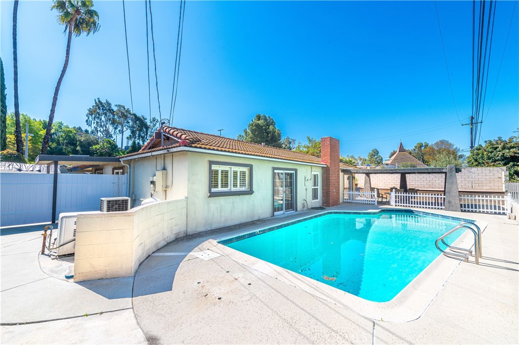 23711 Silver Spray Drive Diamond Bar, CA 91765 - Photo 41 of 49 a view of a house with a swimming pool