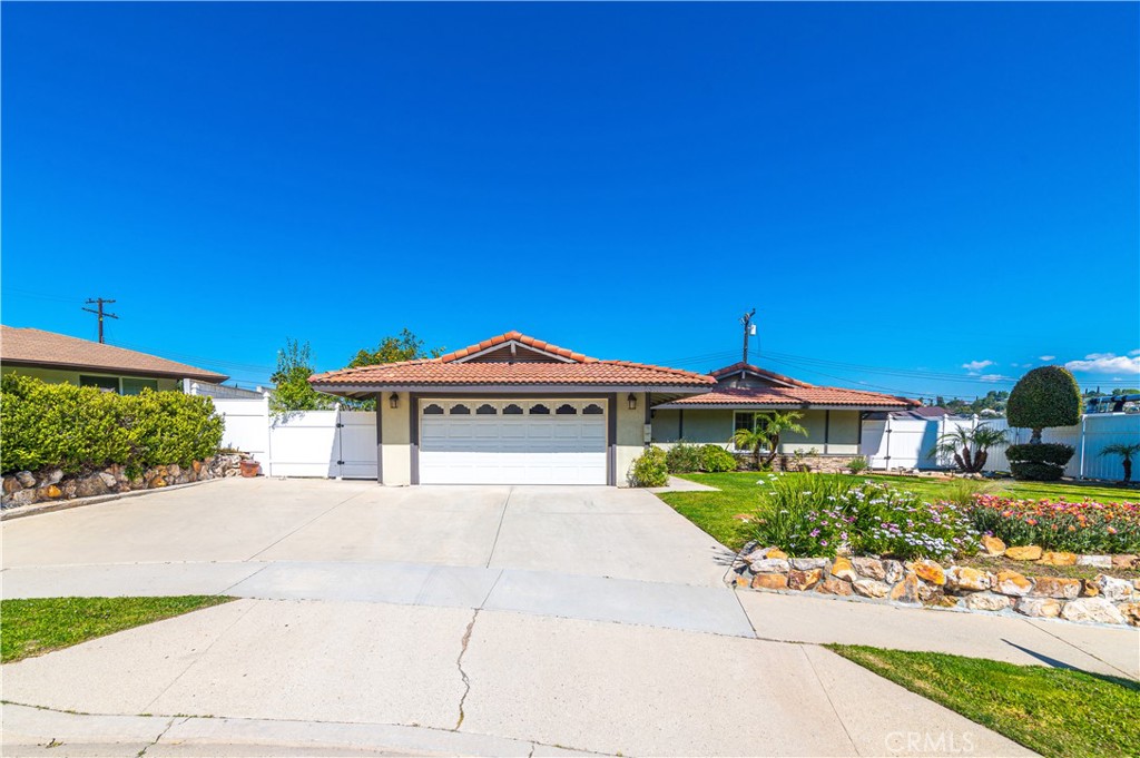 23711 Silver Spray Drive Diamond Bar, CA 91765 - Photo 46 of 49 a front view of a house with a yard