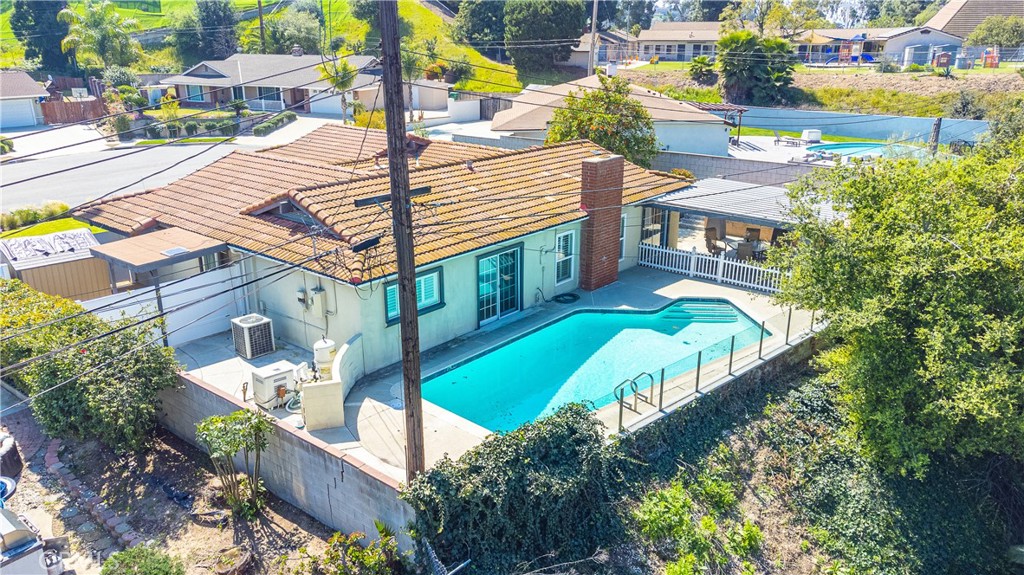 23711 Silver Spray Drive Diamond Bar, CA 91765 - Photo 5 of 49 an aerial view of a house with a yard and potted plants
