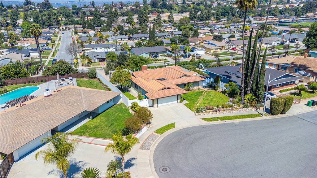 23711 Silver Spray Drive Diamond Bar, CA 91765 - Photo 10 of 49 an aerial view of a house with a yard and lake view