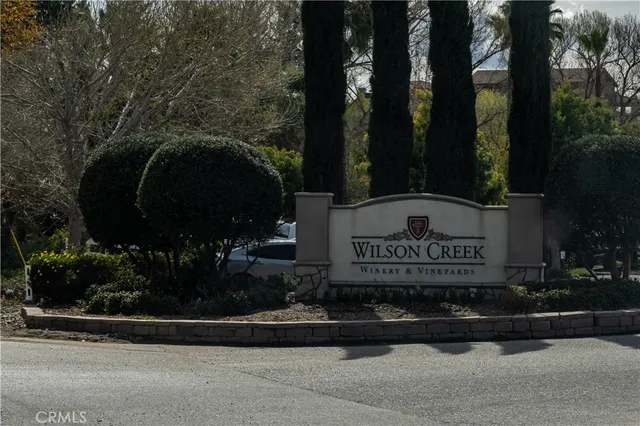 a sign on the side of a road