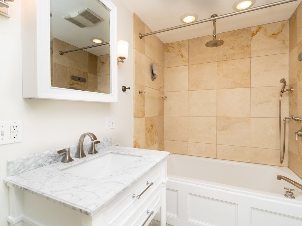 427 Shawmut Avenue, Unit 3 Boston, MA 02118 - Photo 20 of 26 a bathroom with a sink and a shower