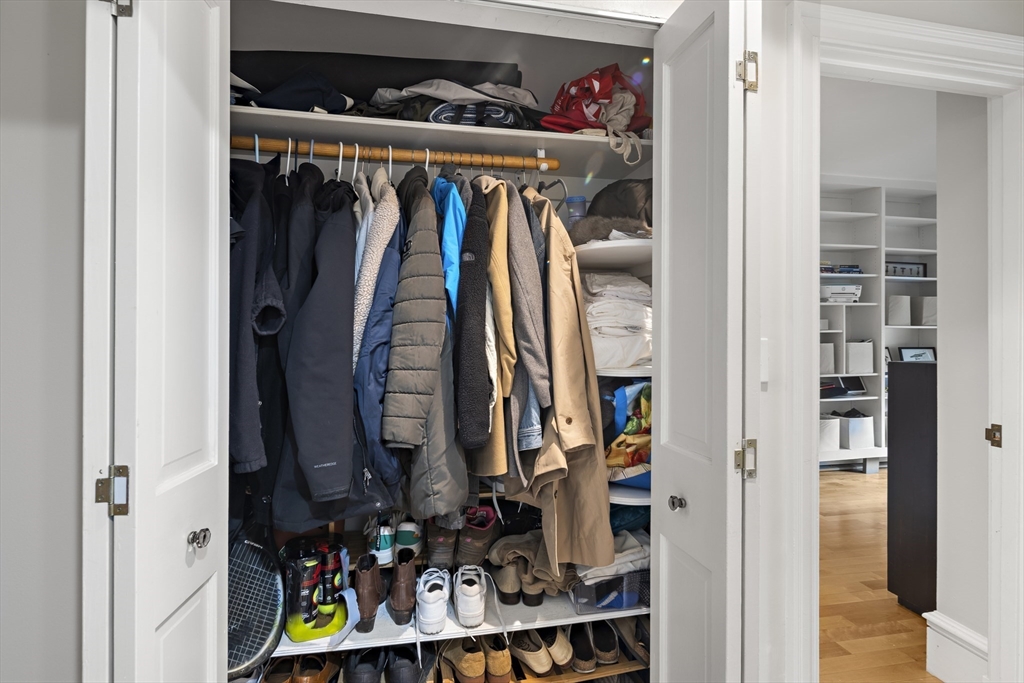 427 Shawmut Avenue, Unit 3 Boston, MA 02118 - Photo 21 of 26 a view of walk in closet with clothes and shoes