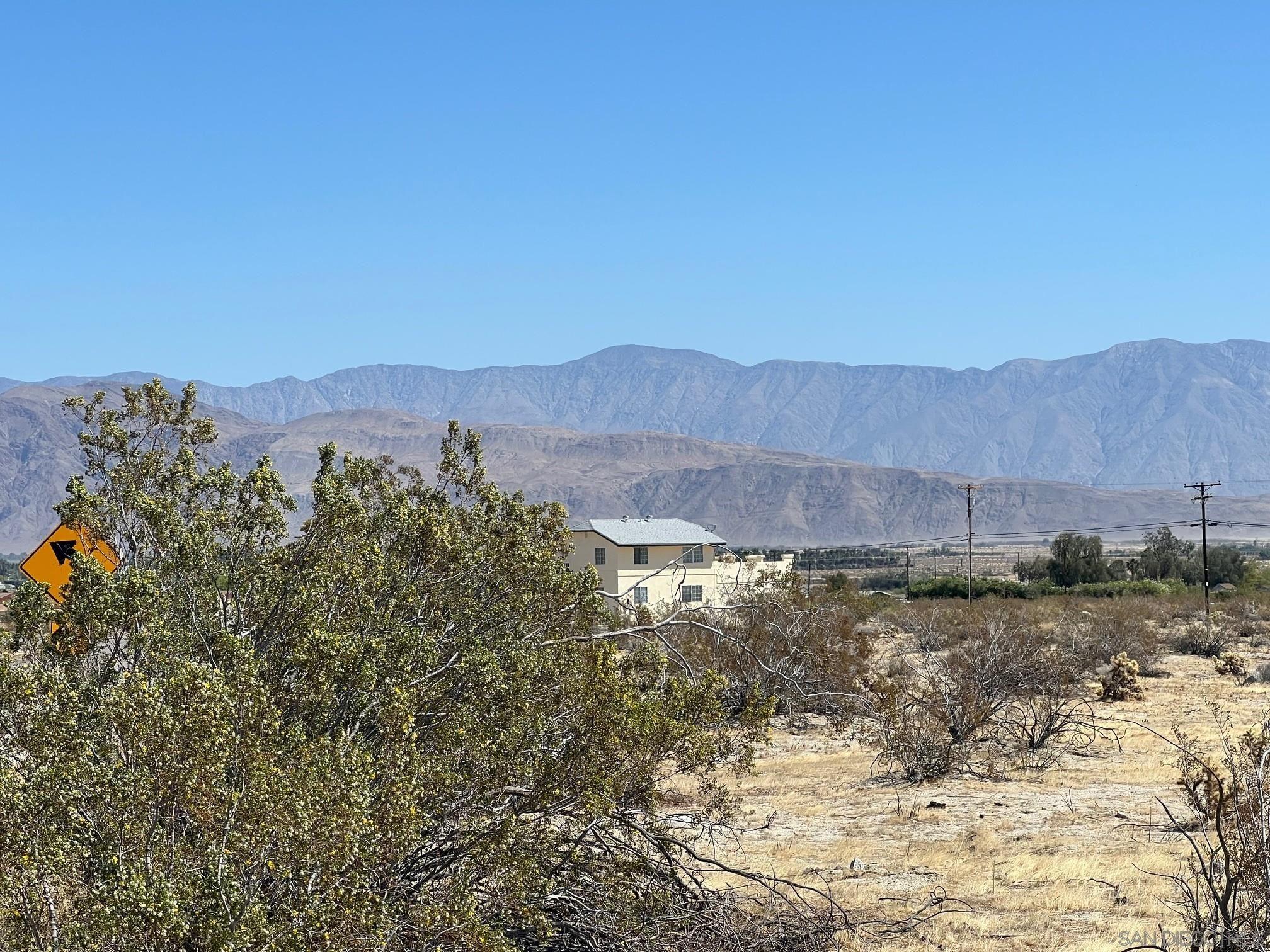 0 Borrego Springs Road, Unit 131 Borrego Springs, CA 92004 - Photo 3 of 10 a view of a house with a mountain and a forest