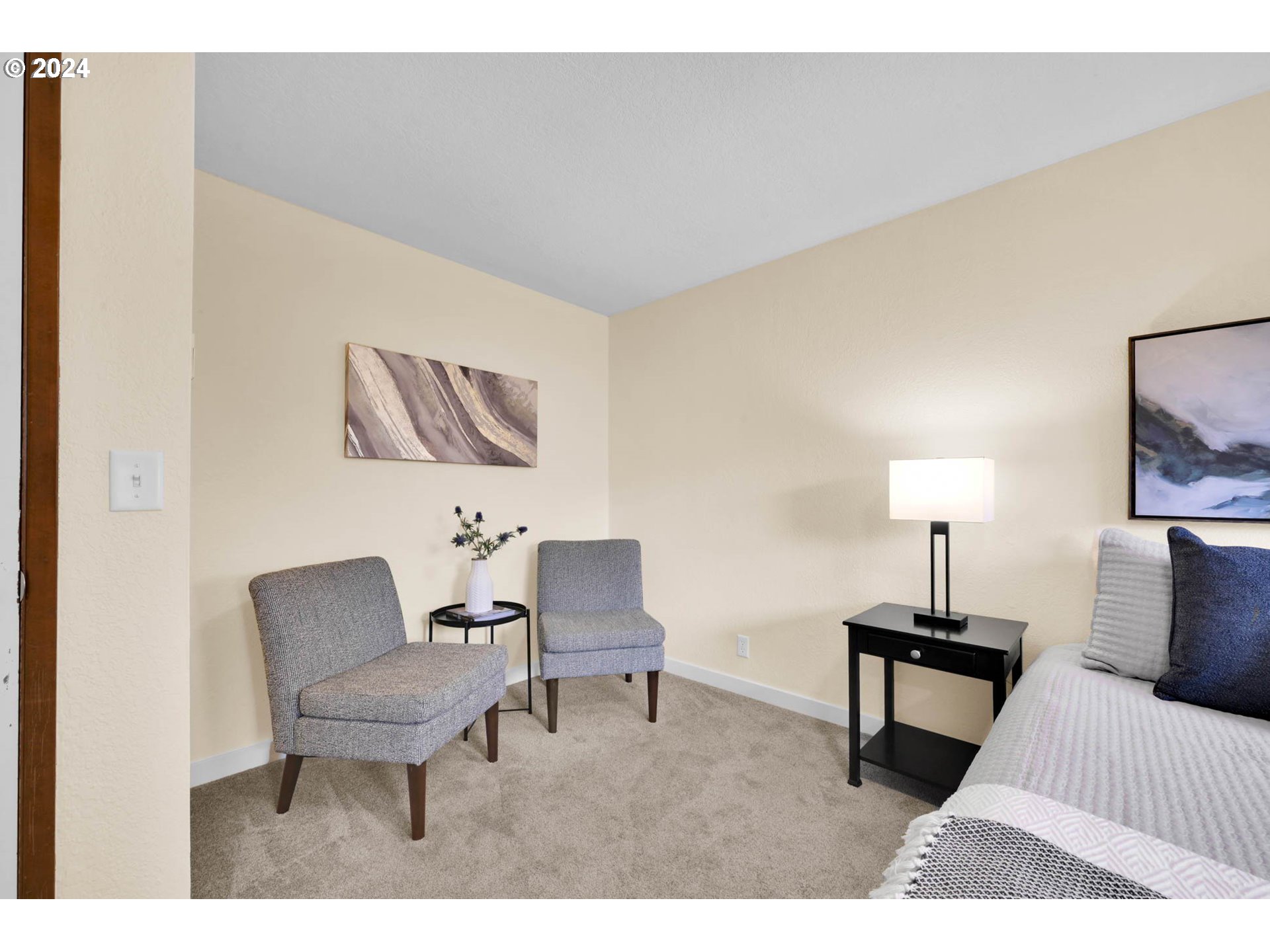 7136 B Street Springfield, OR 97478 - Photo 28 of 46 a bedroom with a bed and a chair