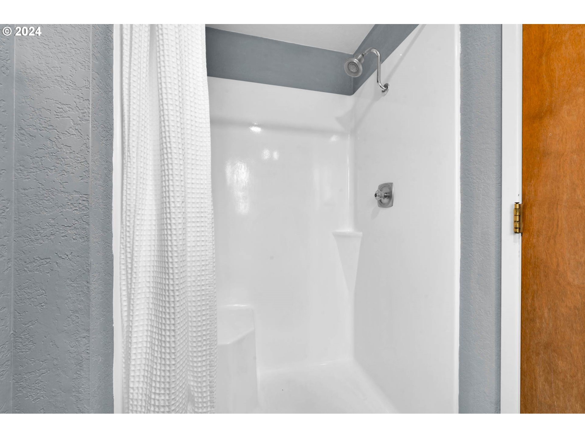 7136 B Street Springfield, OR 97478 - Photo 32 of 46 a bathroom with a shower