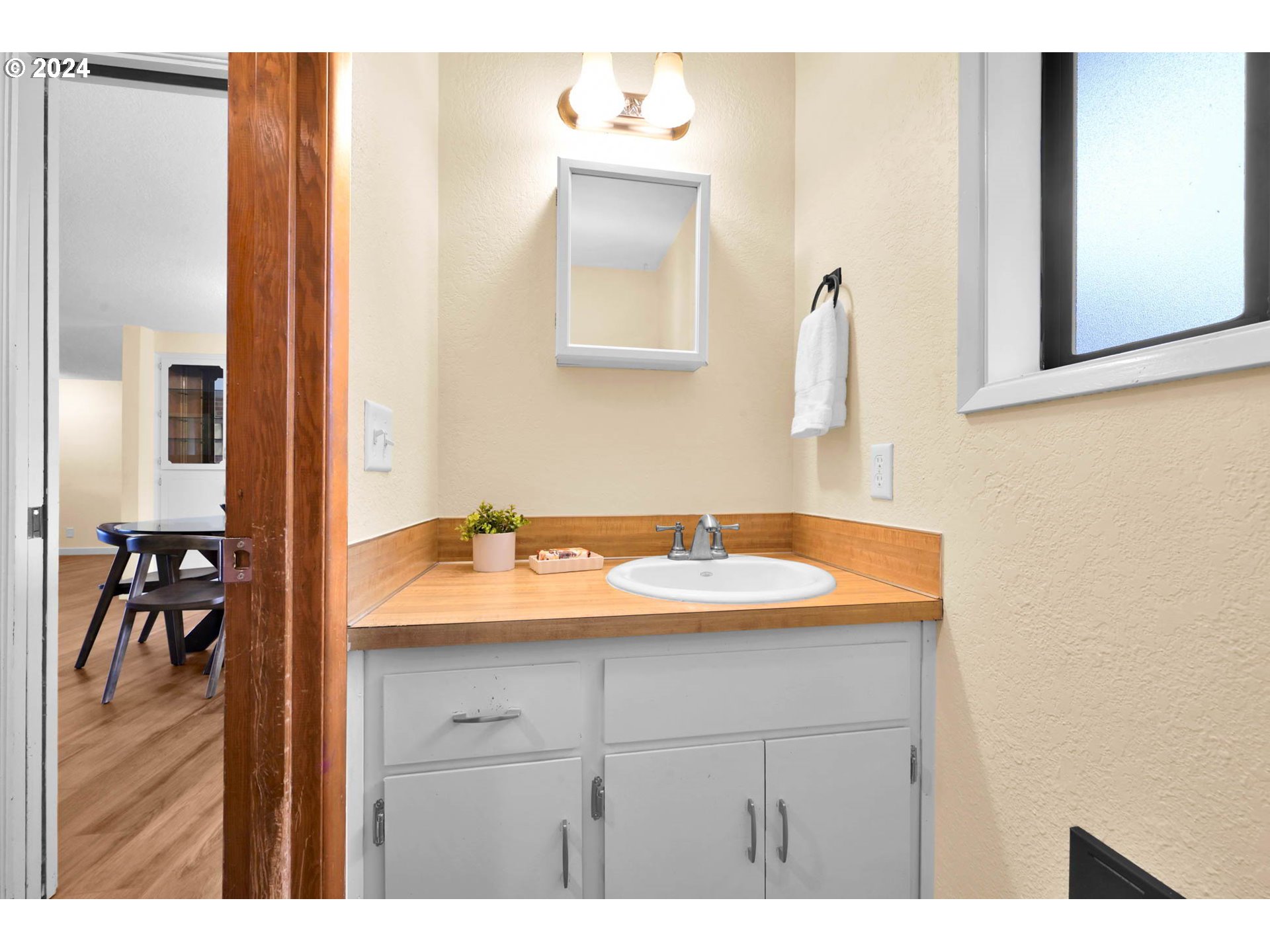 7136 B Street Springfield, OR 97478 - Photo 33 of 46 a bathroom with a sink and a mirror