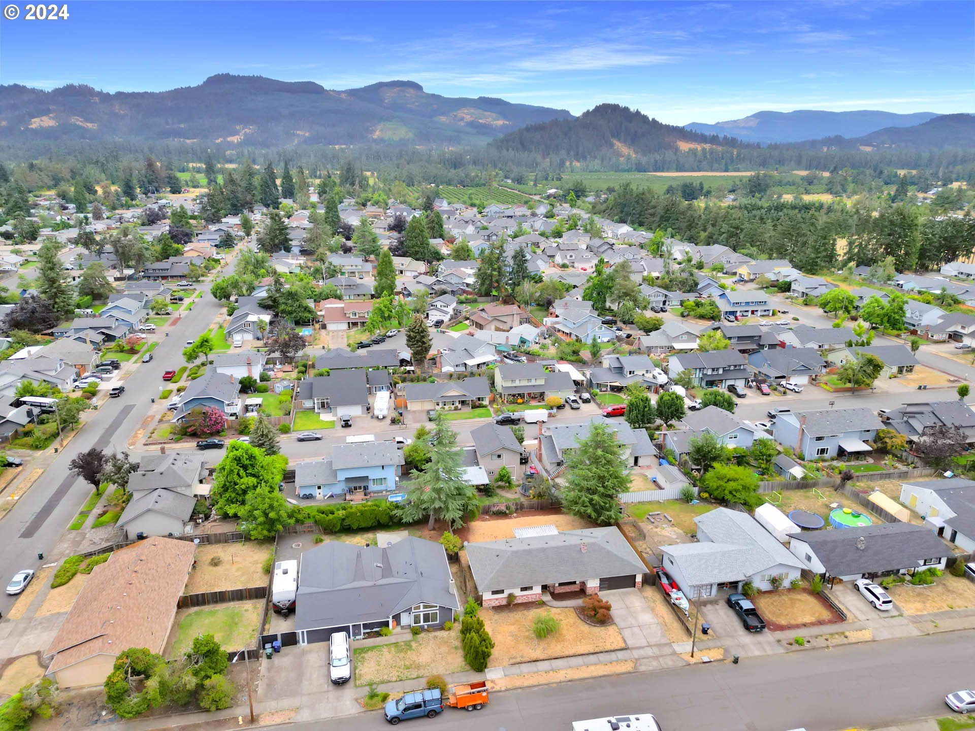 7136 B Street Springfield, OR 97478 - Photo 7 of 46 an aerial view of residential house with parking