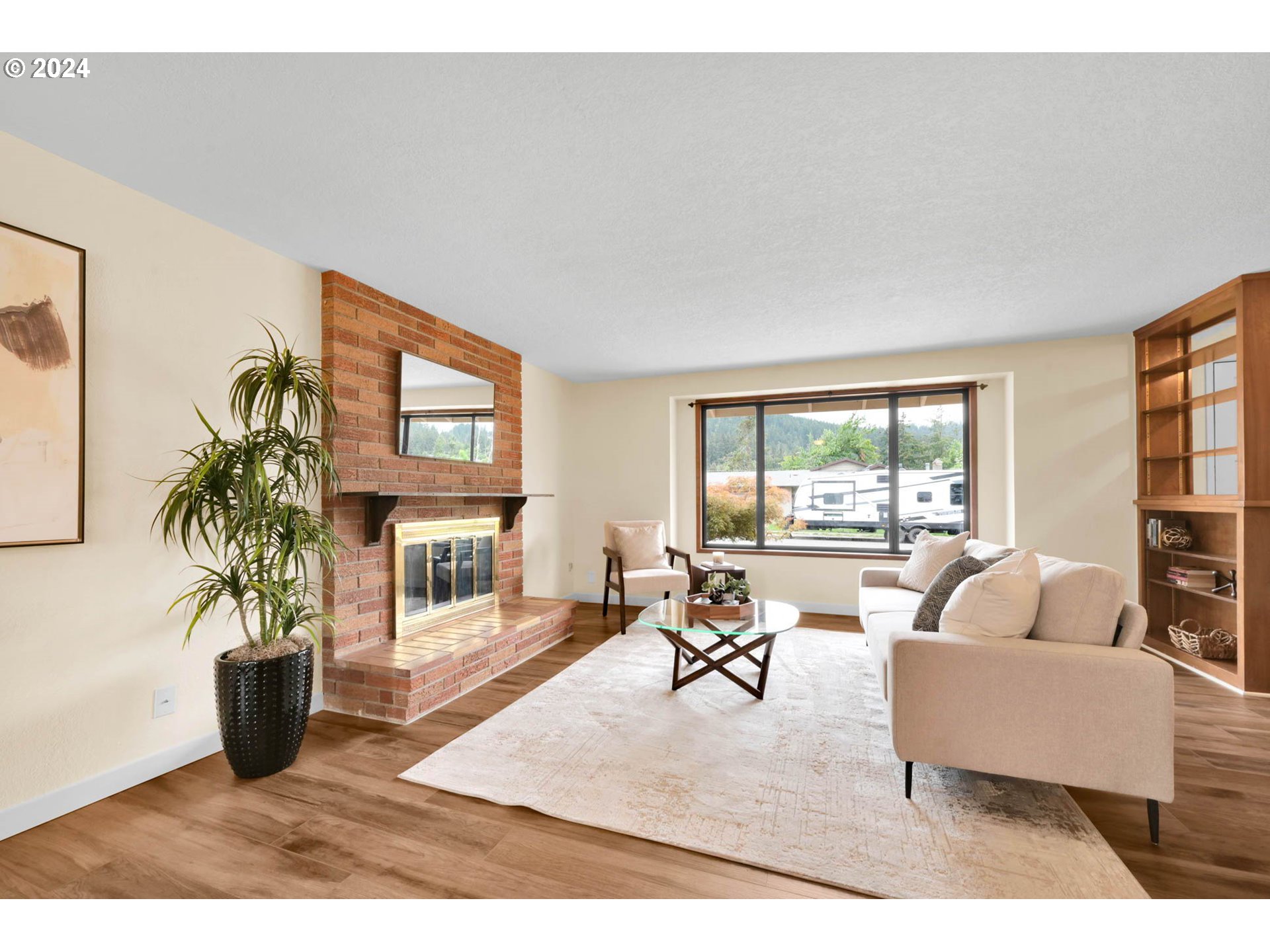 7136 B Street Springfield, OR 97478 - Photo 10 of 46 a living room with furniture and a large window