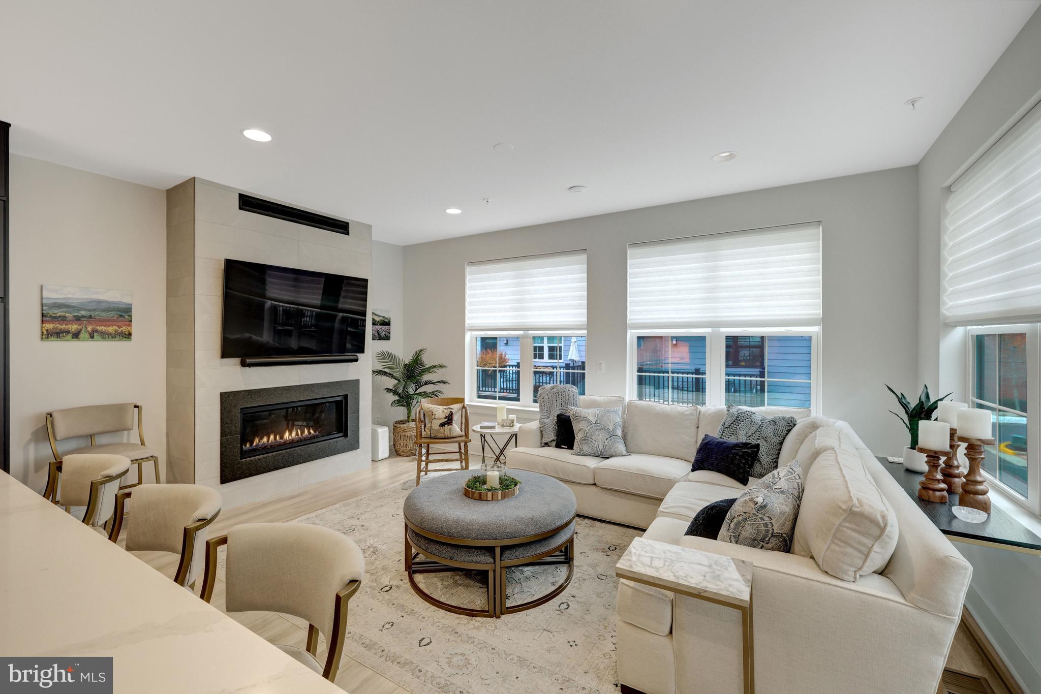 11236 Faraday Park Drive Reston, VA 20190 - Photo 18 of 74 Open & bright family room opens to the kitchen.