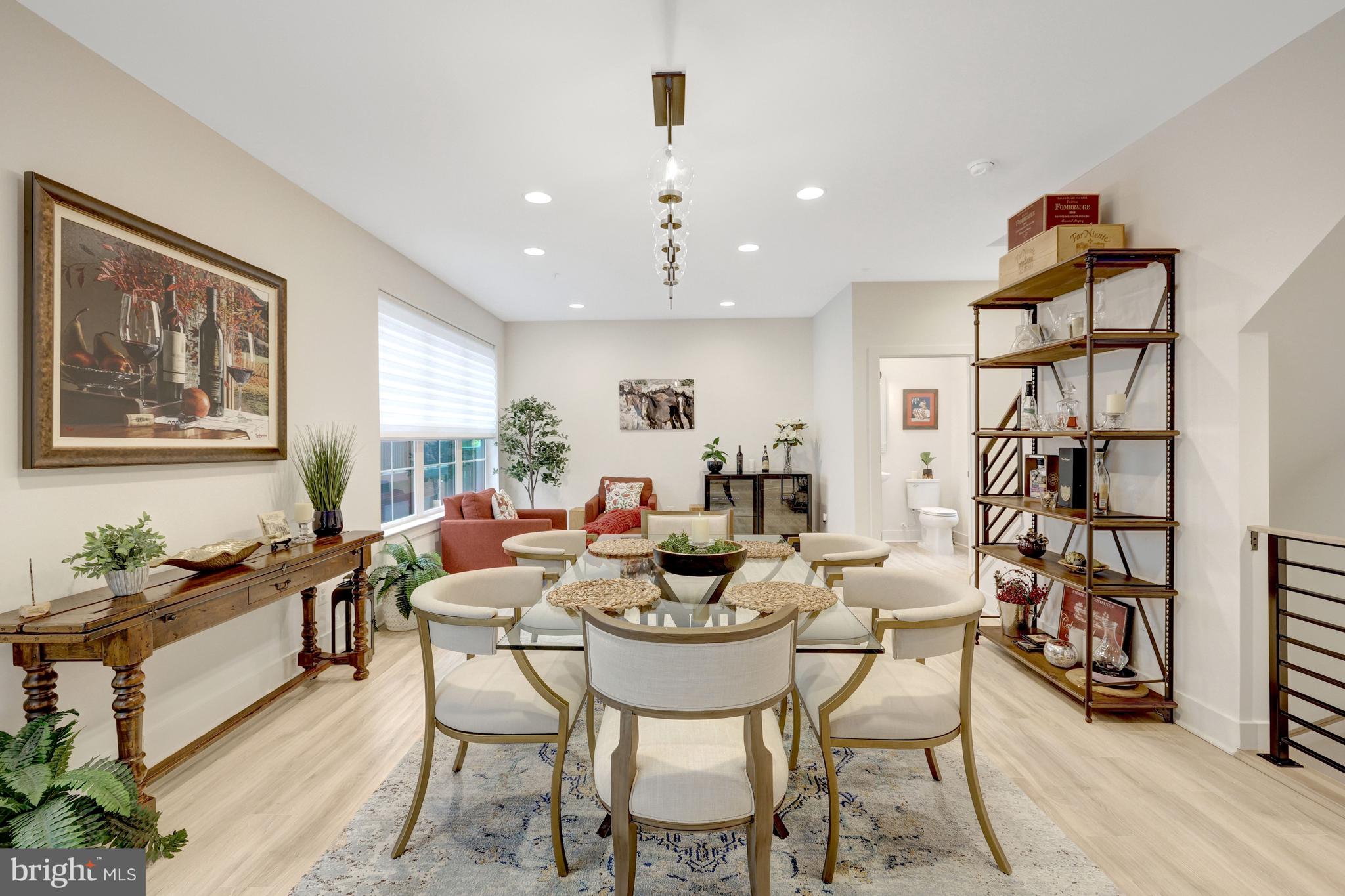 11236 Faraday Park Drive Reston, VA 20190 - Photo 24 of 74 The dining room opens to the living room.