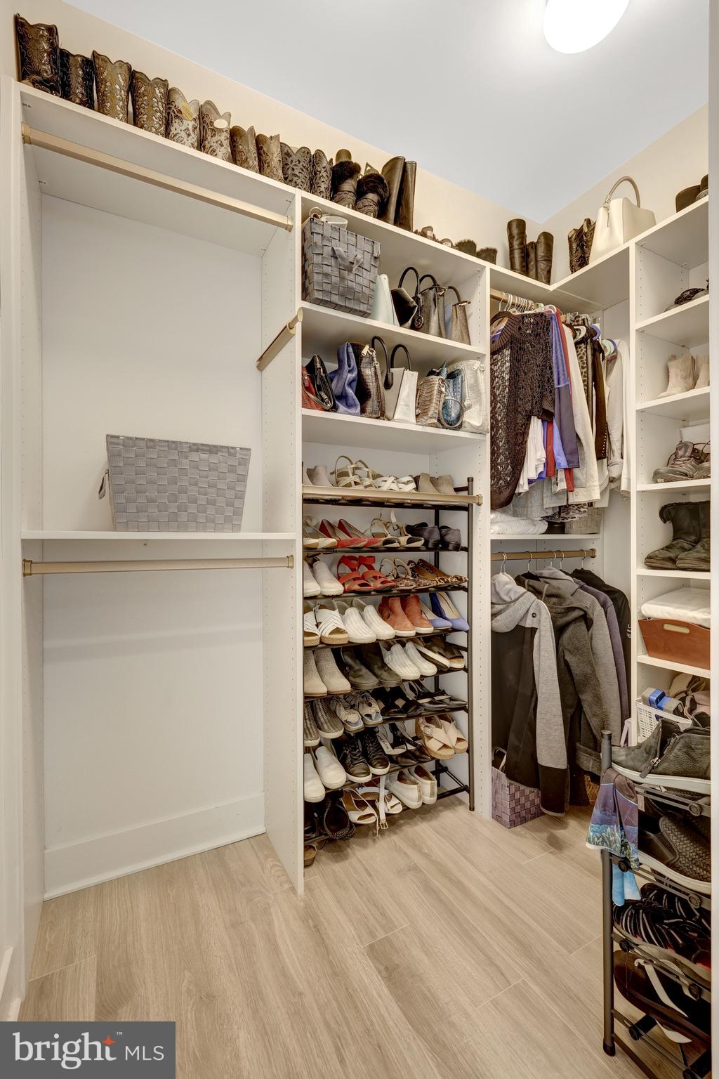 11236 Faraday Park Drive Reston, VA 20190 - Photo 33 of 74 The primary suite features custom walk-in closets.
