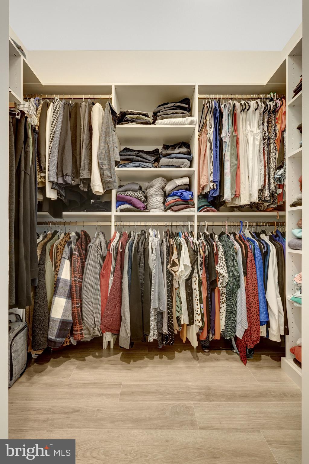 11236 Faraday Park Drive Reston, VA 20190 - Photo 35 of 74 a view of walk in closet with clothes