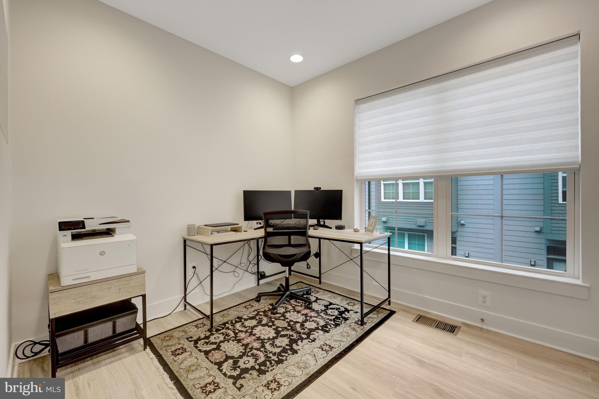 11236 Faraday Park Drive Reston, VA 20190 - Photo 38 of 74 Bedroom #4 features LVP floors & custom blinds.