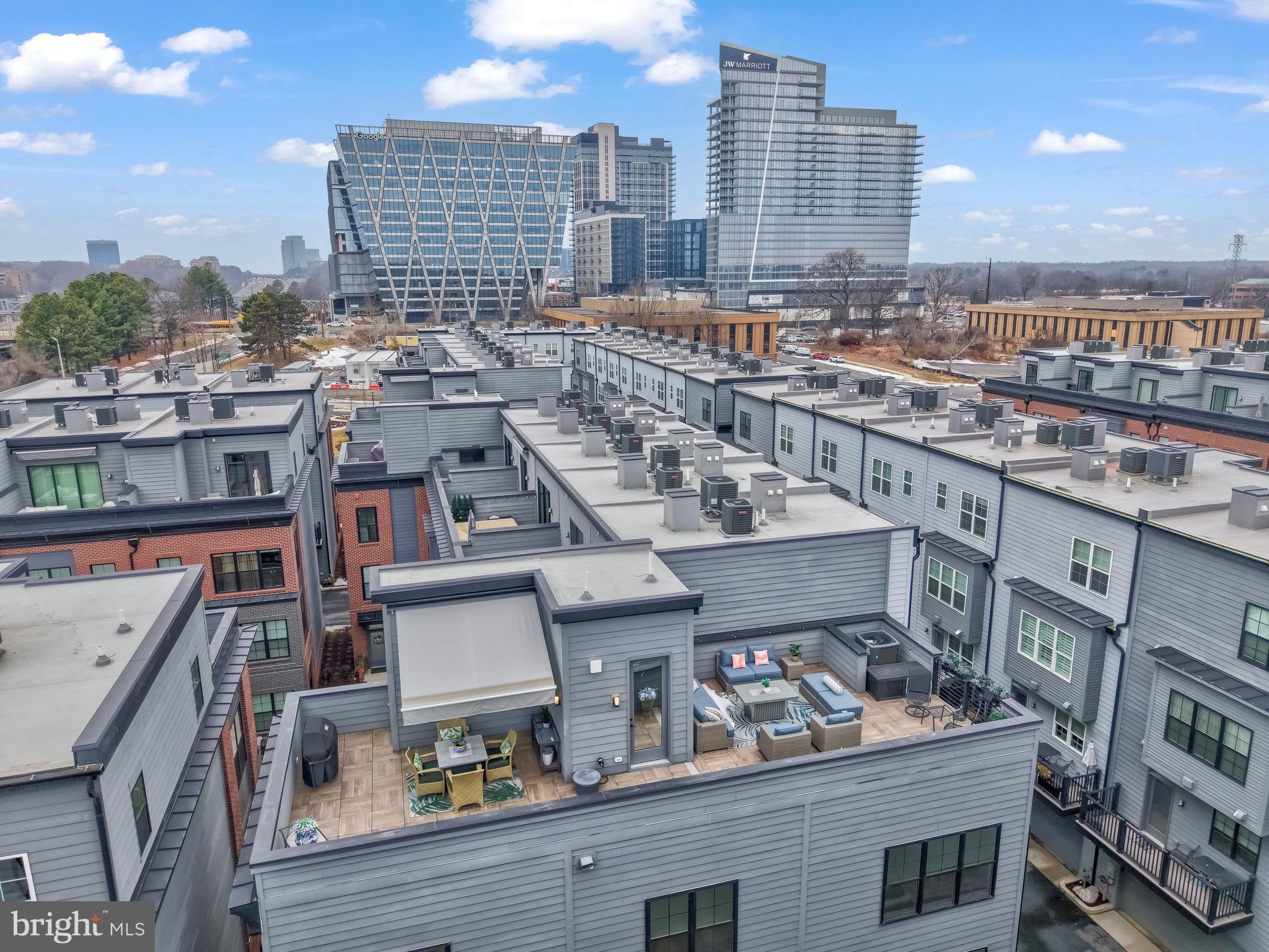 11236 Faraday Park Drive Reston, VA 20190 - Photo 4 of 74 a view of a city with tall buildings