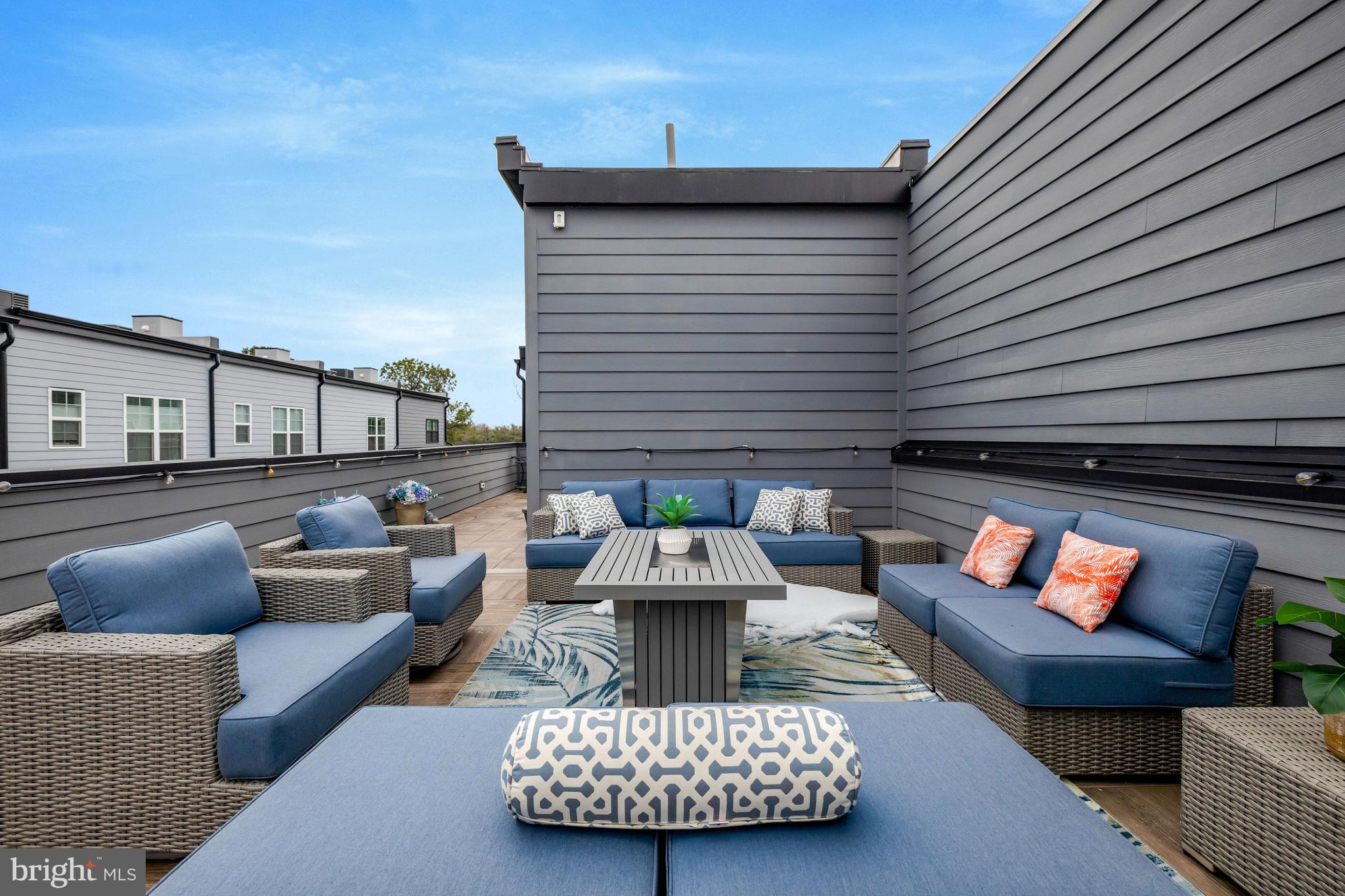 11236 Faraday Park Drive Reston, VA 20190 - Photo 45 of 74 A gas fireplace elevates the rooftop terrace space
