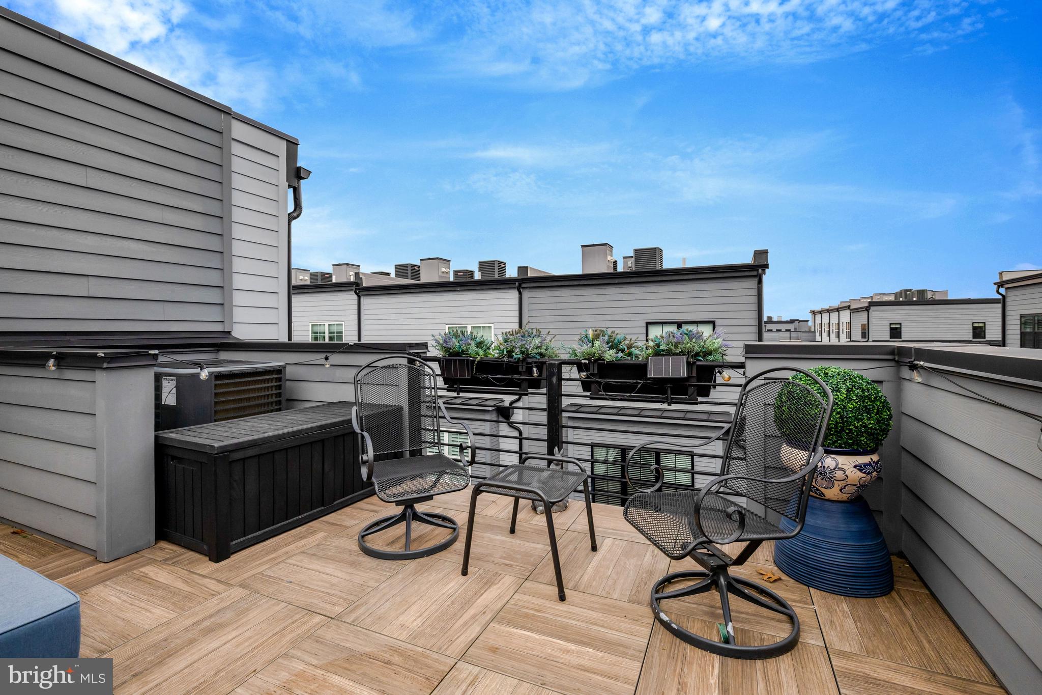 11236 Faraday Park Drive Reston, VA 20190 - Photo 47 of 74 a view of a terrace with furniture and a potted plant