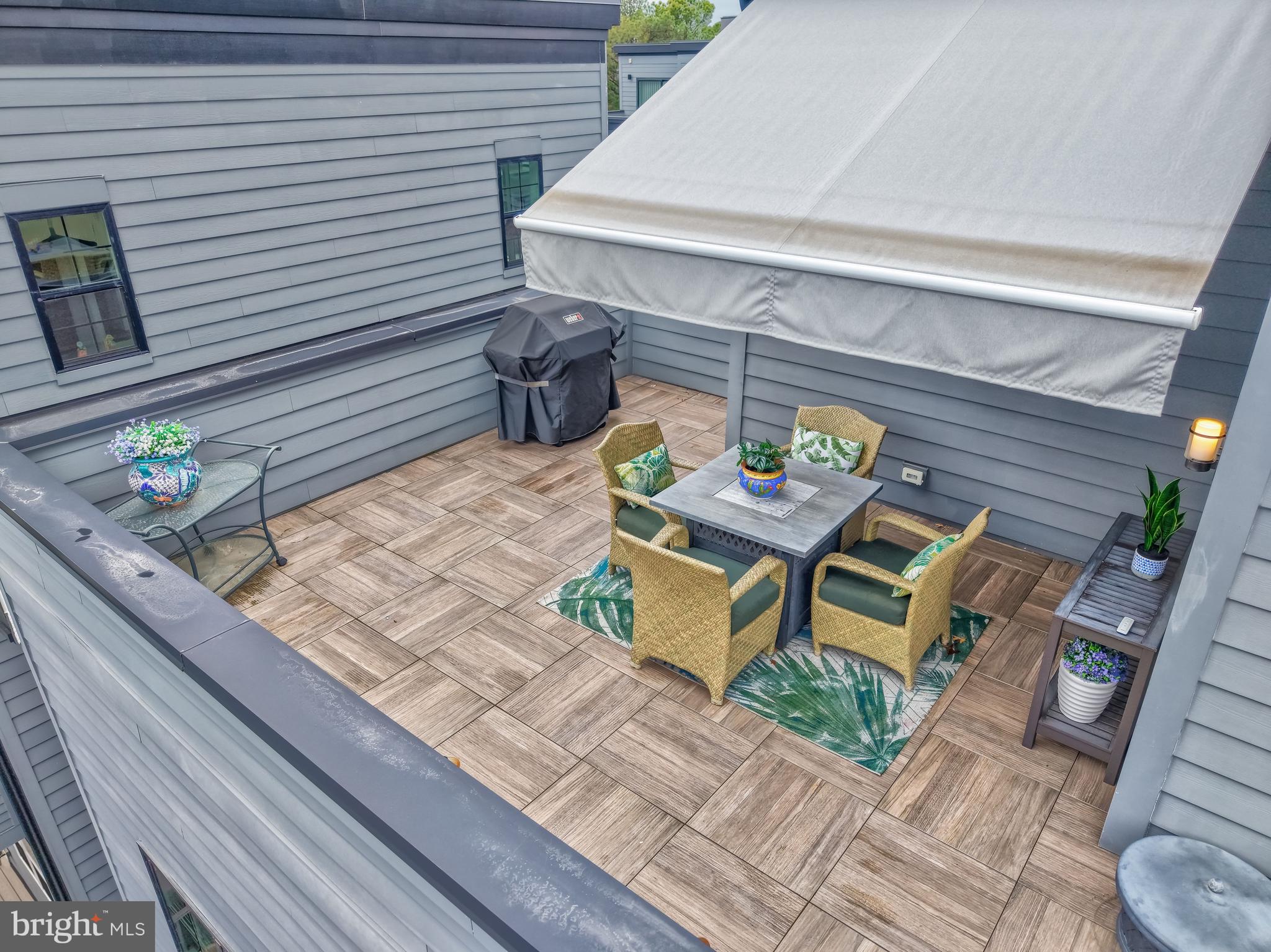 11236 Faraday Park Drive Reston, VA 20190 - Photo 53 of 74 Enjoy the sun or shade with the custom awning.
