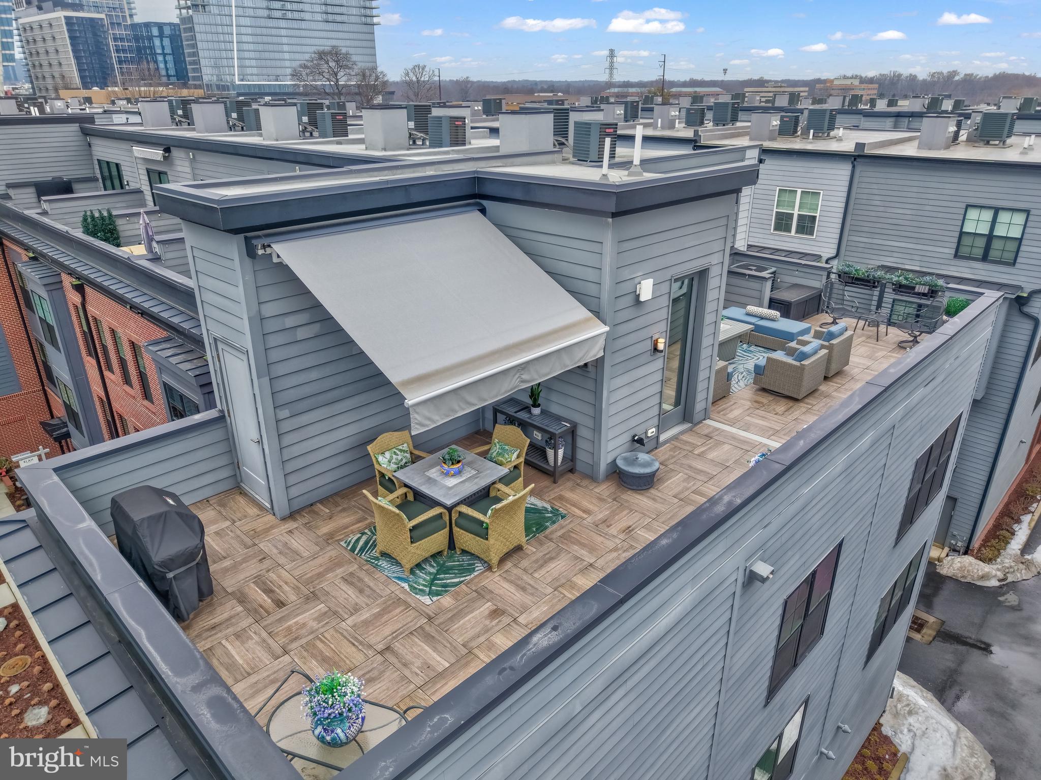 11236 Faraday Park Drive Reston, VA 20190 - Photo 53 of 74 Full-length rooftop terrace with awning.