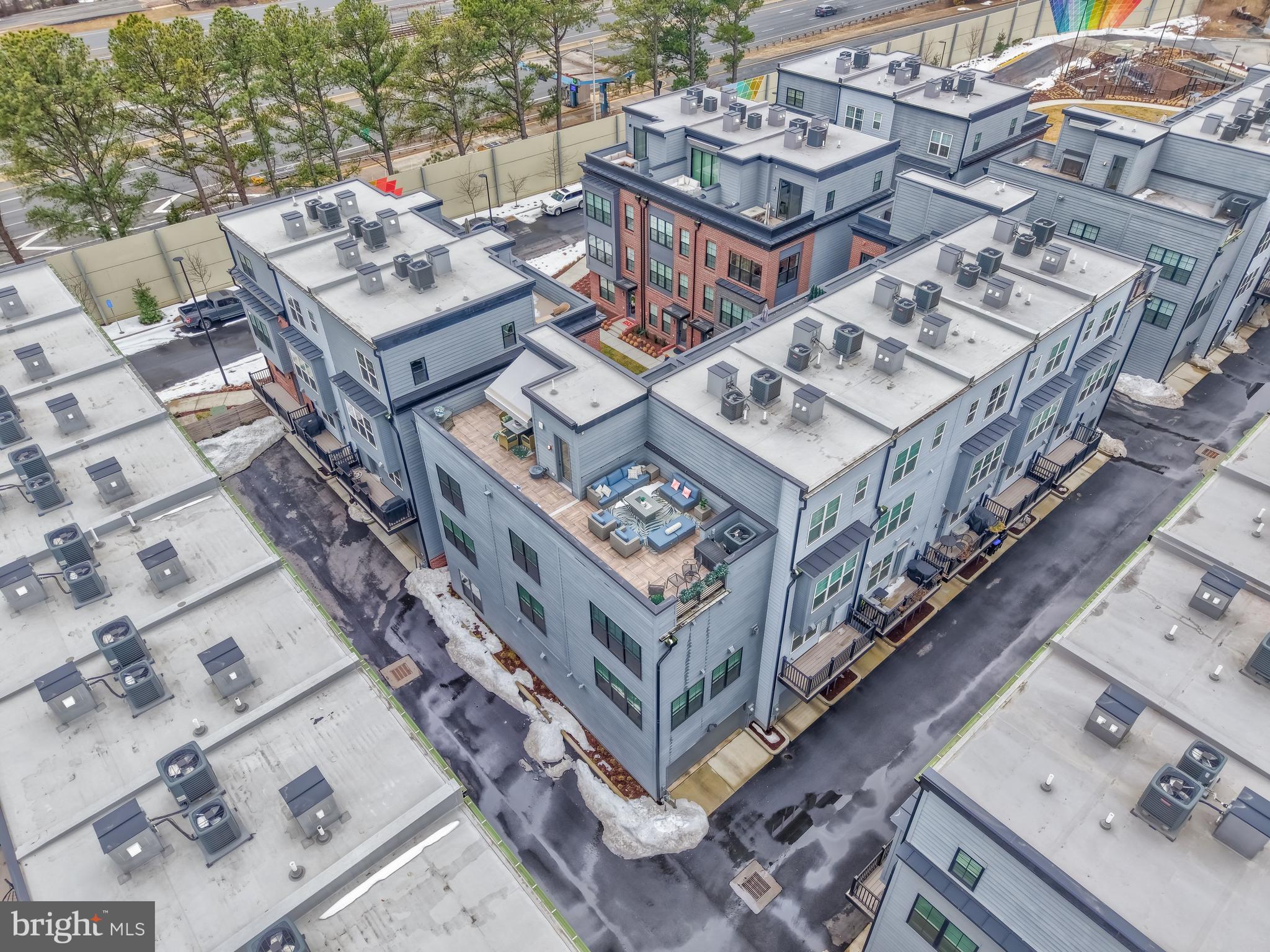 11236 Faraday Park Drive Reston, VA 20190 - Photo 55 of 74 A drone photo of the end unit w/huge terrace.