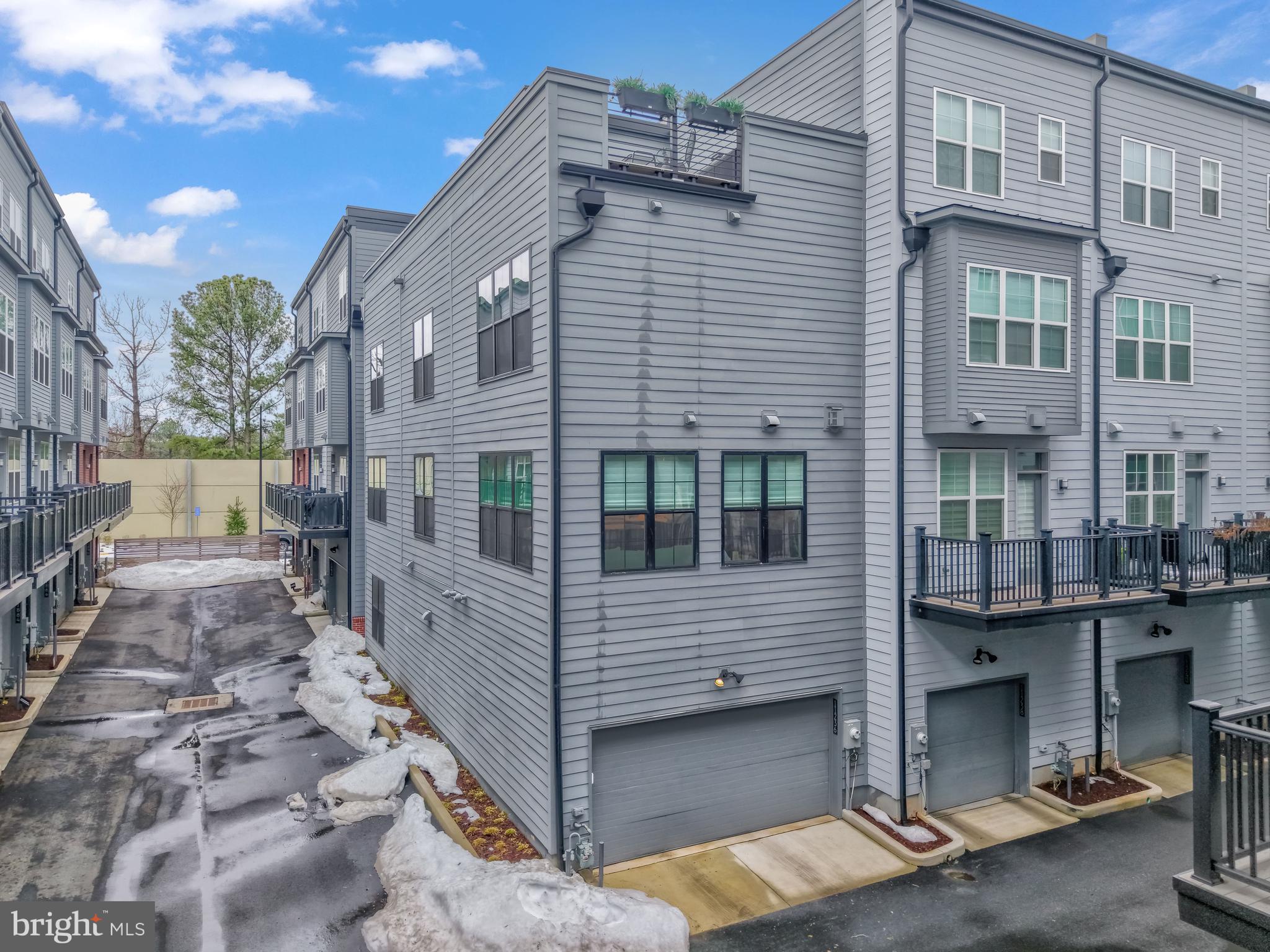 11236 Faraday Park Drive Reston, VA 20190 - Photo 60 of 74 A view of the entrance into the two-car garage.