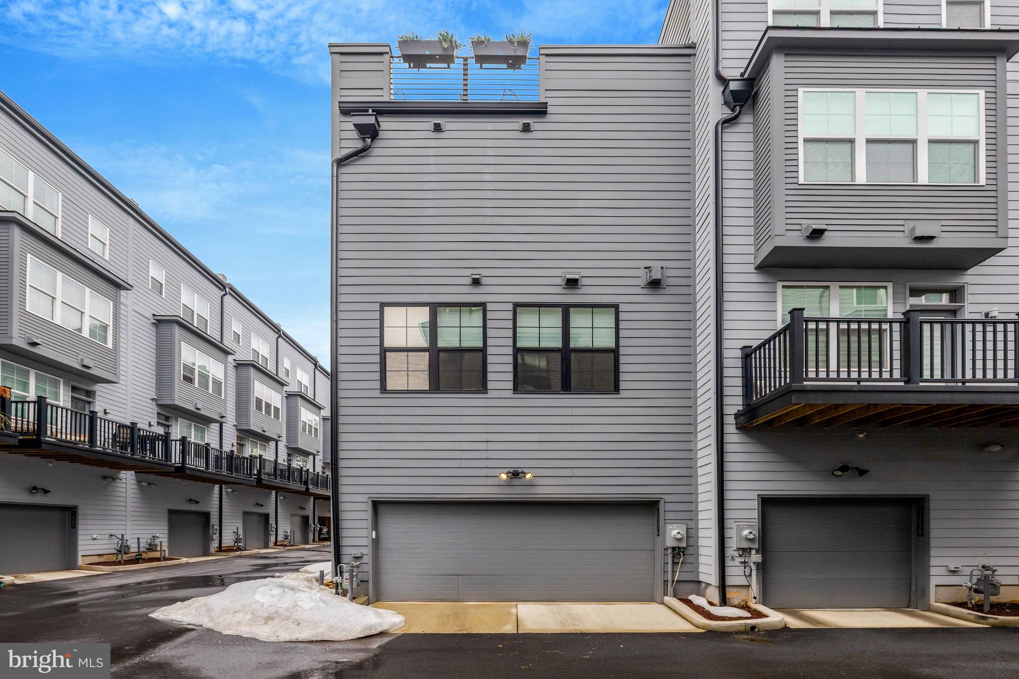 11236 Faraday Park Drive Reston, VA 20190 - Photo 61 of 74 A view of the 2-car garage entrance.