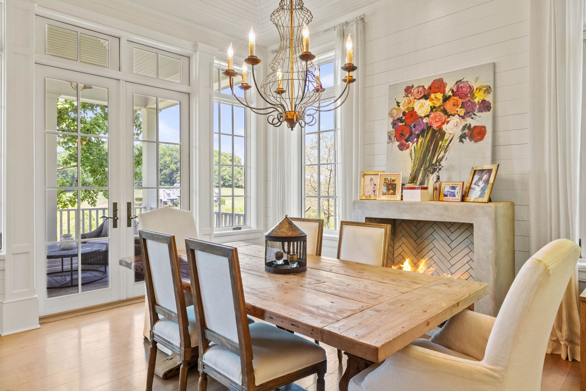3385 Bailey Road Franklin, TN 37064 - Photo 13 of 56 a dining room with furniture a chandelier and wooden floor