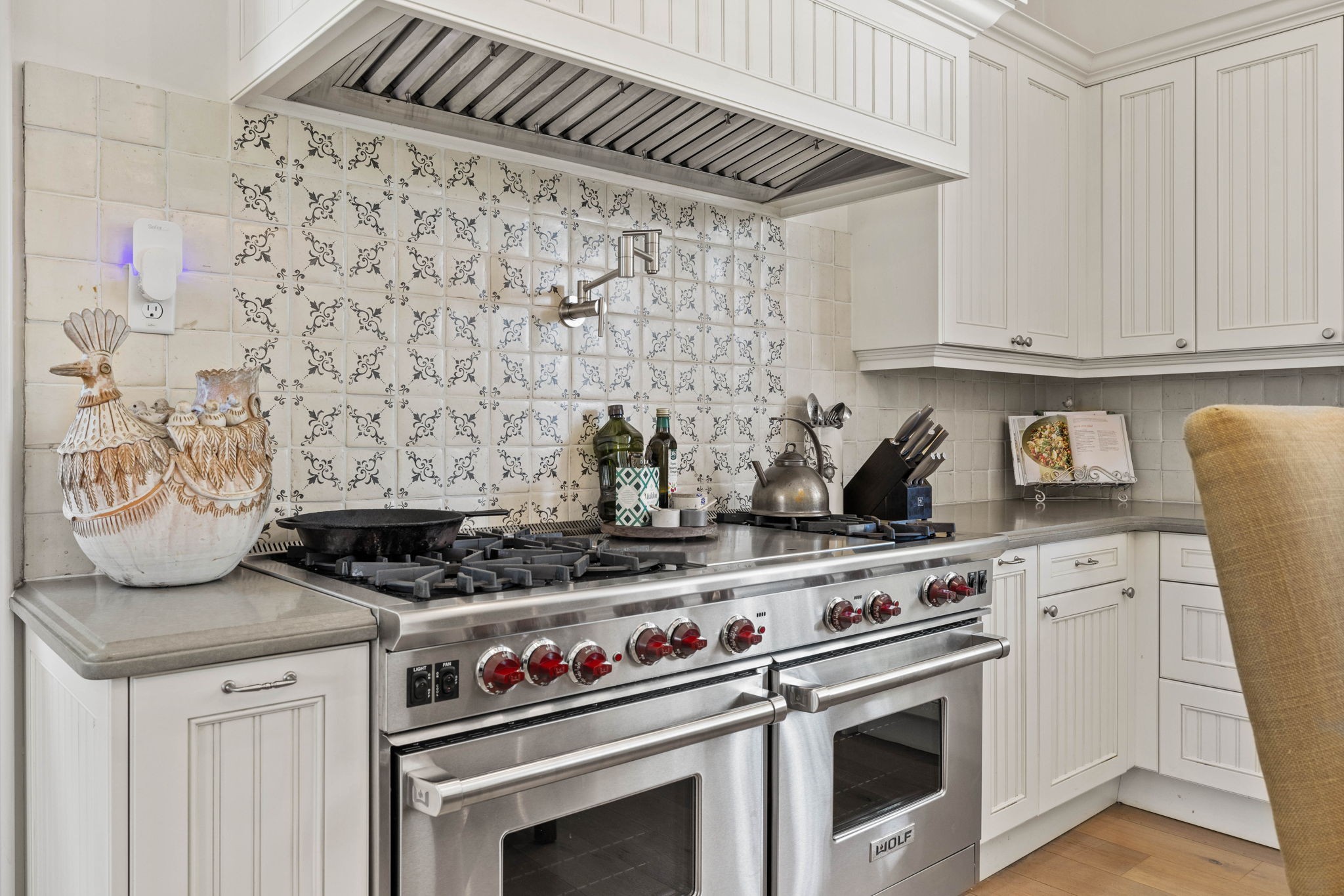 3385 Bailey Road Franklin, TN 37064 - Photo 16 of 56 a kitchen with stainless steel appliances granite countertop a stove and a white cabinets