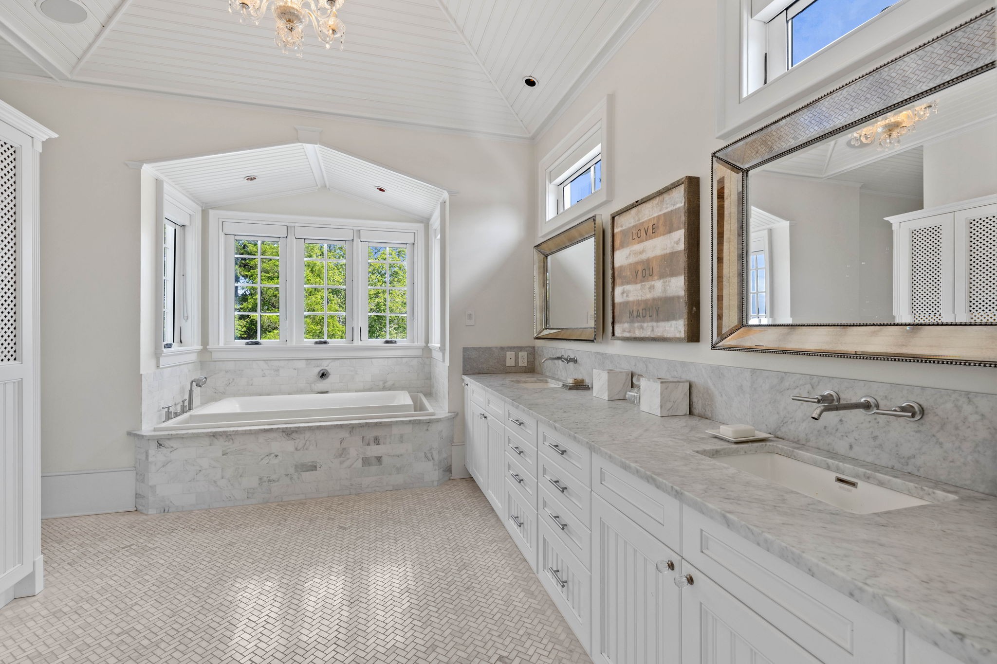 3385 Bailey Road Franklin, TN 37064 - Photo 22 of 56 a large bathroom with a granite countertop double vanity sink a large mirror and a bathtub
