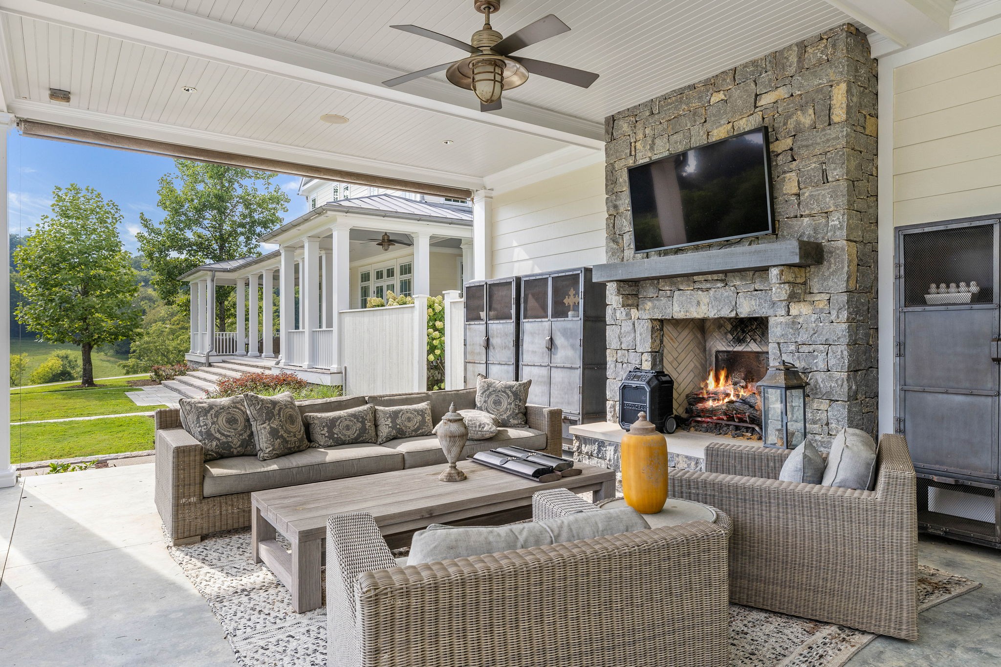 3385 Bailey Road Franklin, TN 37064 - Photo 39 of 56 a living room with furniture a fireplace and a flat screen tv