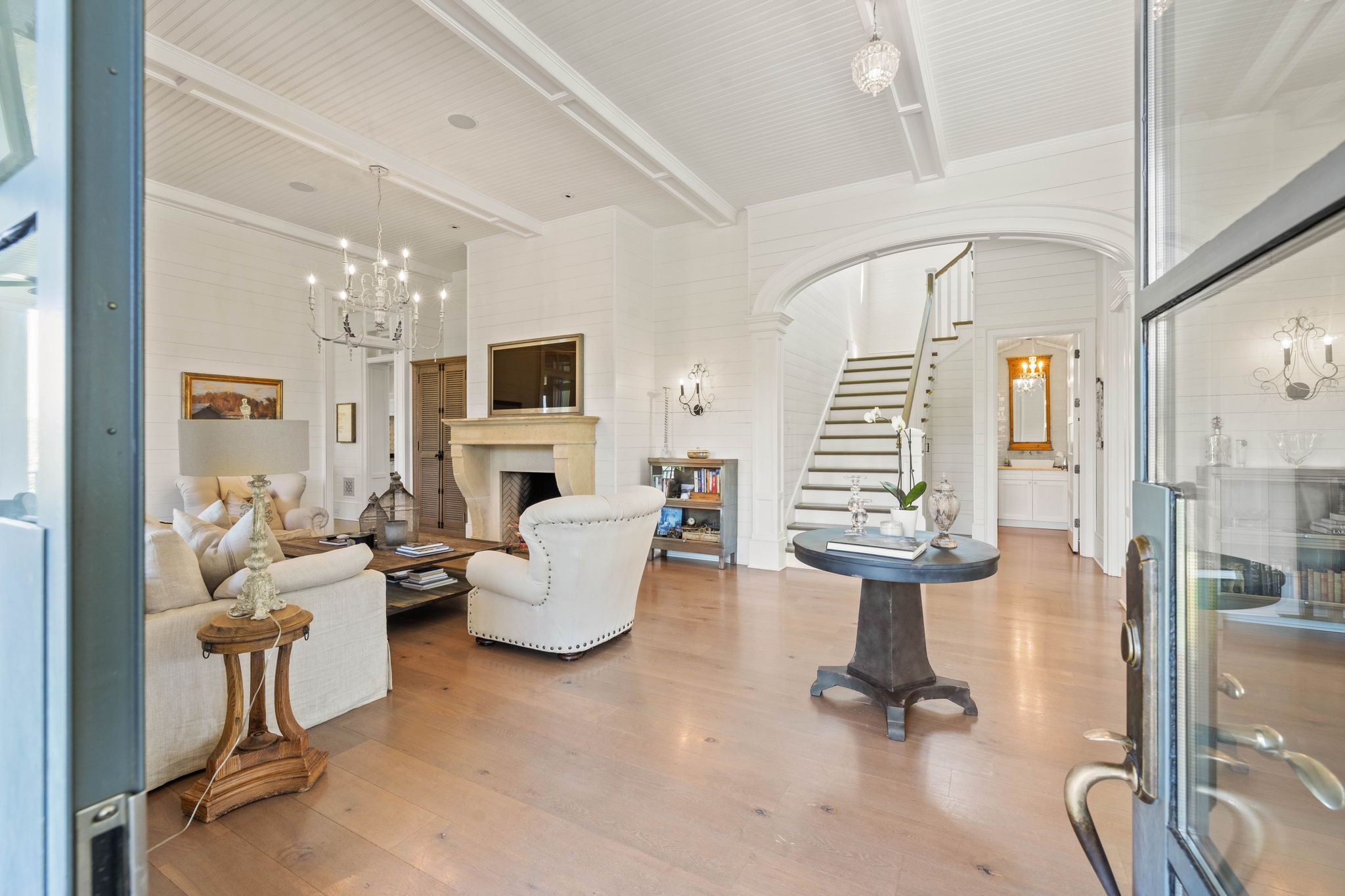 3385 Bailey Road Franklin, TN 37064 - Photo 8 of 56 a living room with fireplace furniture and a chandelier
