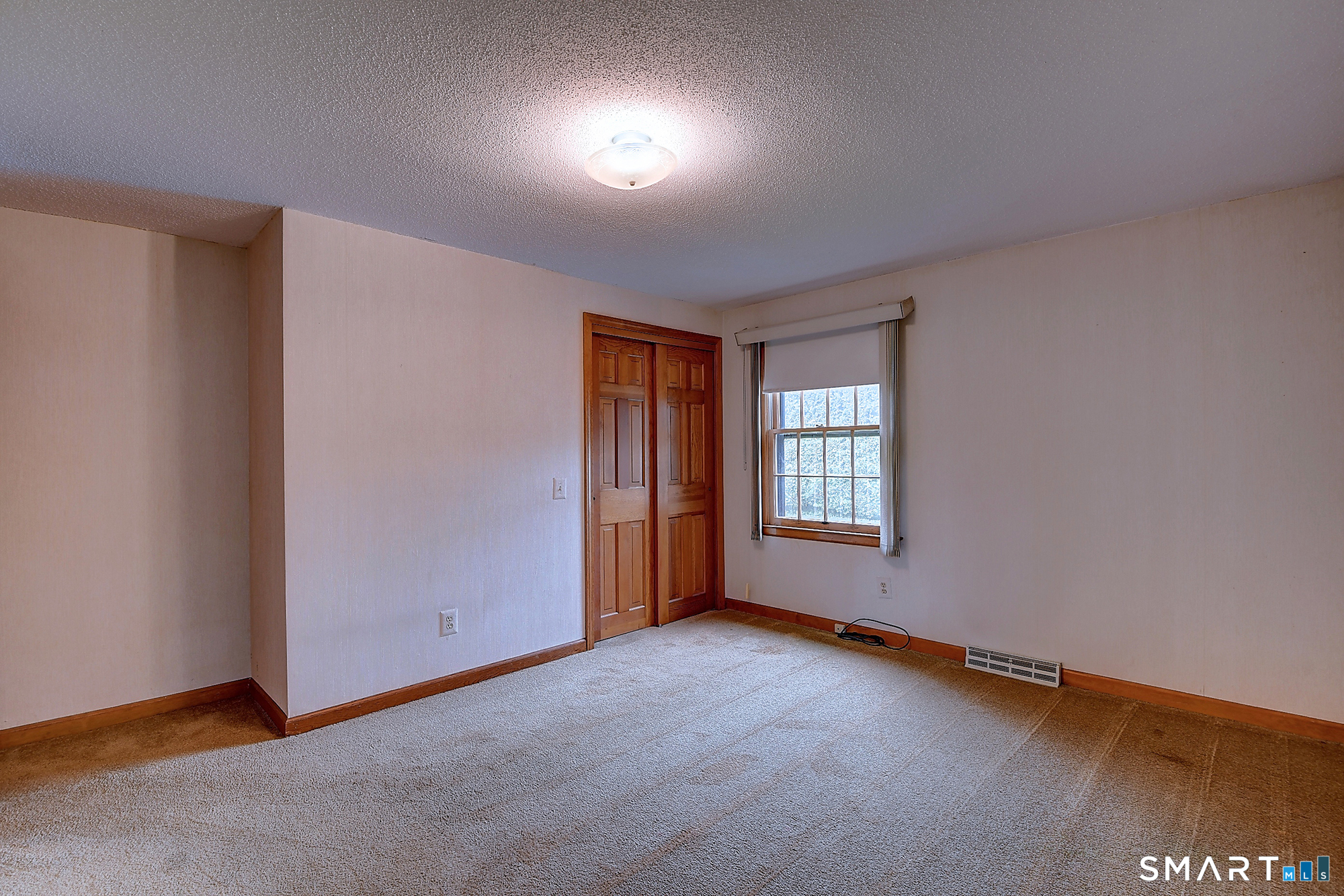 80 Grist Mill Road Wethersfield, CT 06109 - Photo 33 of 40 an empty room with a window