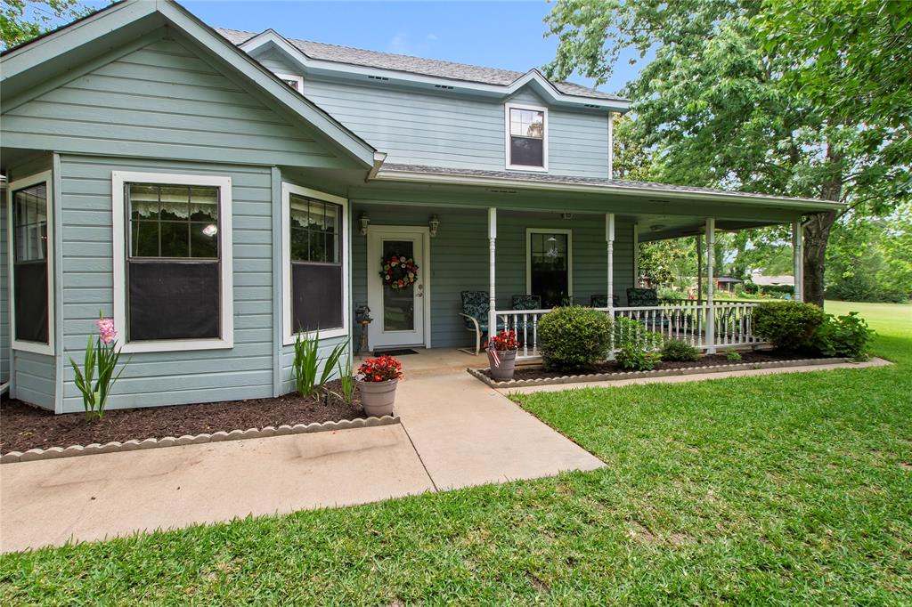 455 Stirrup Ranch Road Trinidad, TX 75163 - Photo 18 of 20 a front view of a house with porch