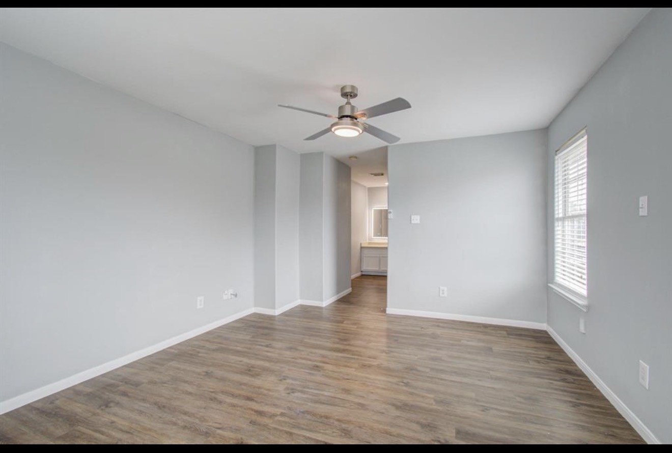 3131 Chaffin Street Houston, TX 77087 - Photo 7 of 11 a view of an empty room with a window