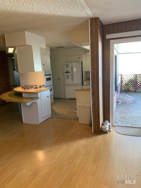 175 Westgate Circle Santa Rosa, CA 95401 - Photo 13 of 17 a kitchen with stainless steel appliances granite countertop a stove and a refrigerator