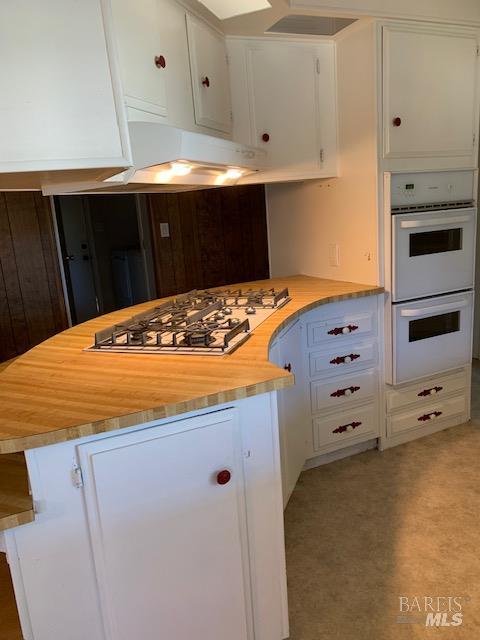 175 Westgate Circle Santa Rosa, CA 95401 - Photo 14 of 17 a bedroom with a bed and a cabinets