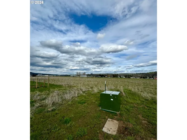 a view of a lake from a balcony