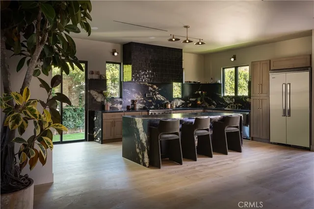 a bathroom with a granite countertop sink mirror and double