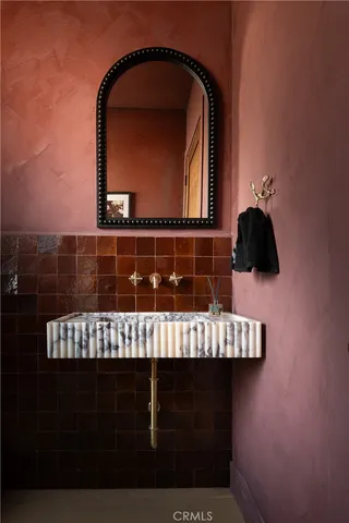 a white bath tub sitting in a bathroom