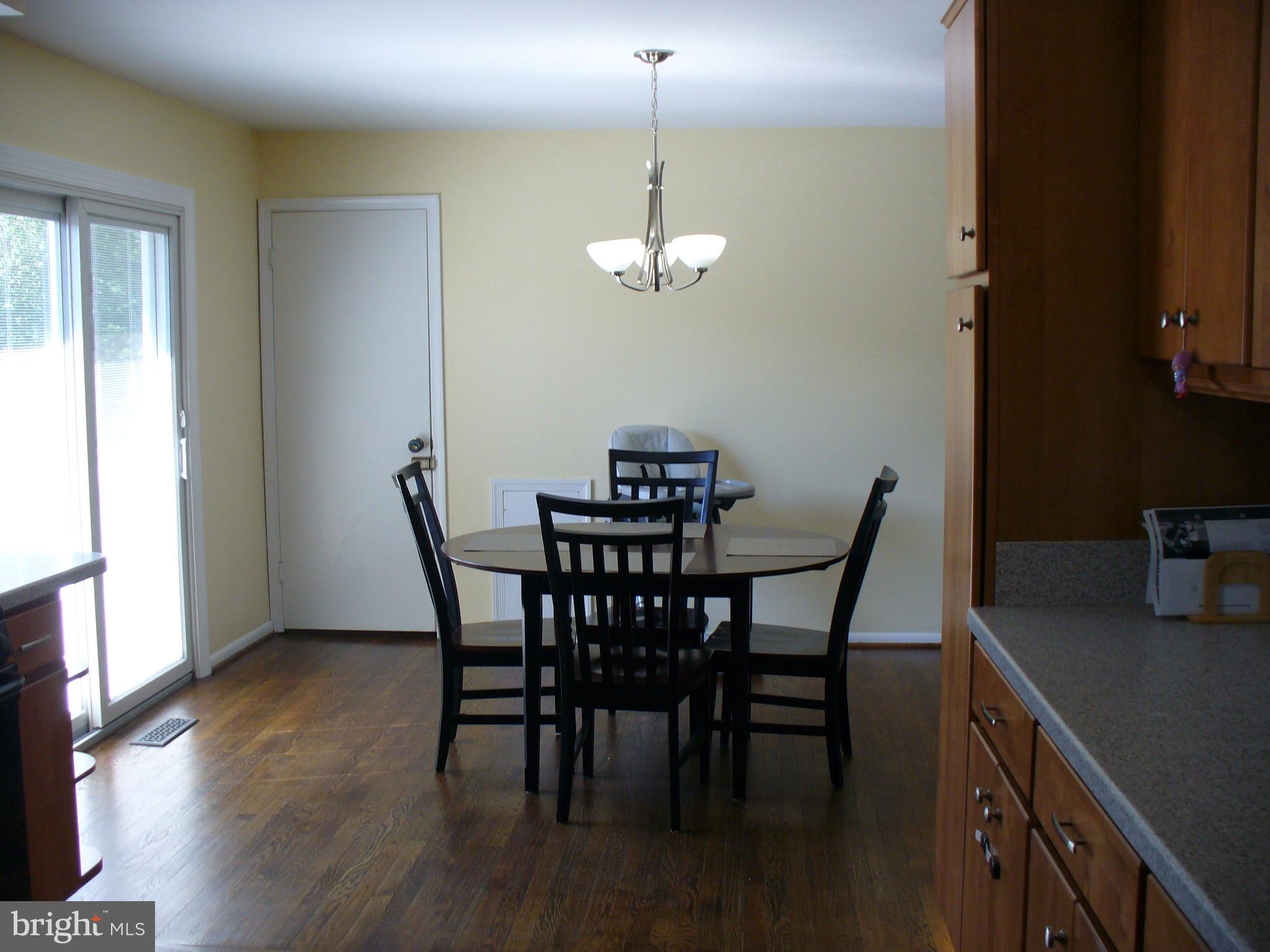 3424 Falling Green Road Olney, MD 20832 - Photo 19 of 47 Dining room with dark wood floors