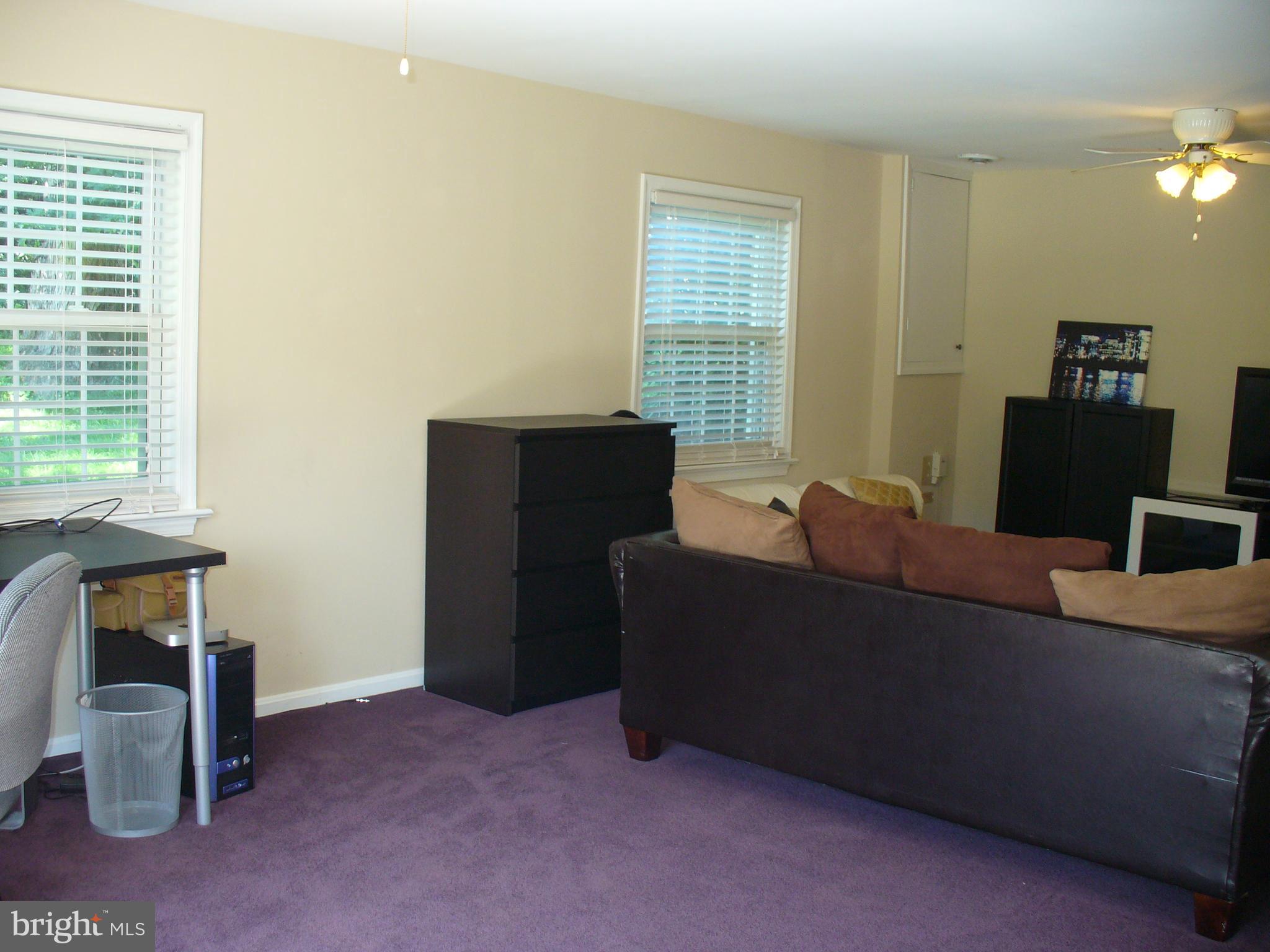 3424 Falling Green Road Olney, MD 20832 - Photo 37 of 47 Basement family room with walkout